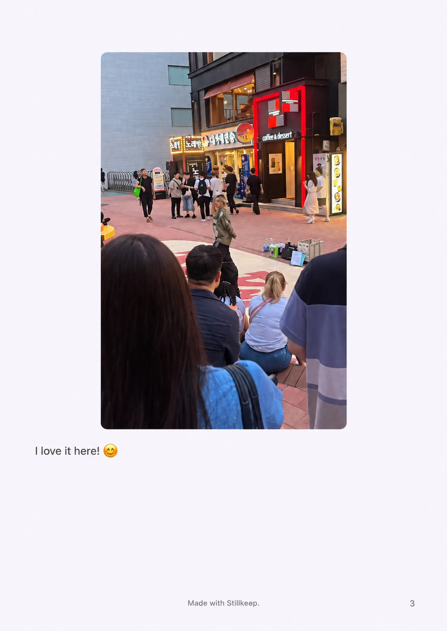 Internal page of a Stillkeep PDF photobook showing a Seoul street photo and the caption I love it here